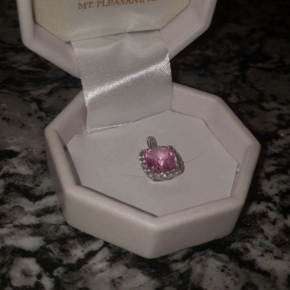 Diamond surround pink jewel